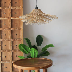 Handcrafted rattan pendant light with tiered jerami design, showcasing intricate motifs from Bali.