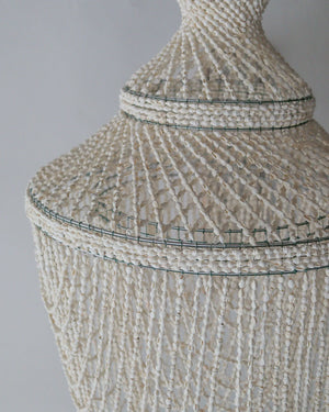 Handmade Balinese seashell chandelier with intricate beadwork and natural white shells