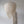 Handmade seashell chandelier with cascading strands and carved wooden wall art decor