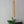 Handcrafted rattan pendant light in tube design, showcasing natural variations and artisan craftsmanship.