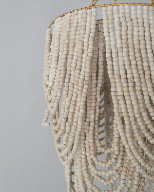 Beaded white chandelier with intricate design, perfect for home decor, handcrafted in Bali, Indonesia.