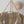 Handcrafted beaded chandelier in gold, featuring a unique white wash finish, showcasing Bali artistry.