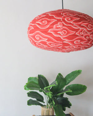 Fabric Chandelier Batik in oval shape, handcrafted linen hanging lamp from Bali, adds a stylish touch to your home decor.