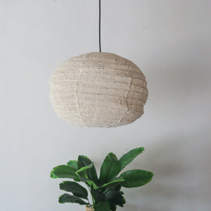 Cotton chandelier lantern in pumpkin shape, handmade in Bali, ideal for customizable interior lighting.