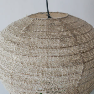 Cotton chandelier lantern in pumpkin shape, handcrafted in Bali, featuring unique linen texture.