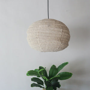 Cotton chandelier lantern in pumpkin shape, handcrafted in Bali, Indonesia. Unique design and color options available.