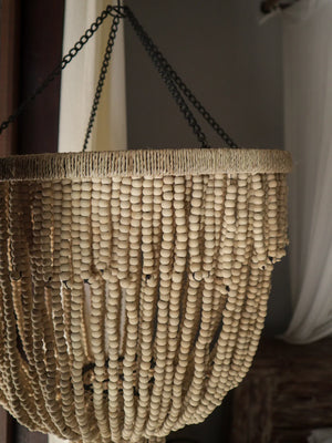 Handmade Balinese beaded chandelier with natural wooden beads and black metal chains
