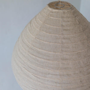 Handcrafted beige linen pendant lampshade with natural, textured fabric detail