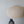 Handmade natural linen pendant lamp with woven texture in minimalist decor setting