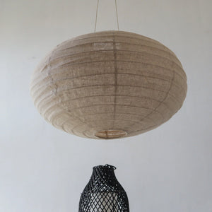 Handmade natural fiber pendant lamp with woven shade, minimalist home decor