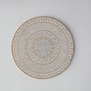Hand carved ethnic wall panel decoration featuring intricate circular pattern, perfect for home decor.