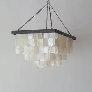 Handcrafted Balinese seashell chandelier with rectangular shell accents, luxury home decor