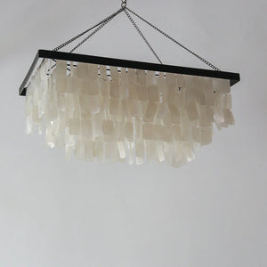 Handmade rectangular seashell chandelier with cascading white shell pieces, modern decor