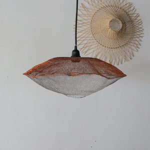 Handwoven rattan pendant light with unique mesh design, Balinese artisan home decor