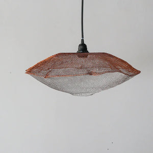 Handcrafted wire mesh pendant light in copper and silver tones, modern minimalist decor