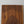 Hand-carved wooden door panel with intricate Balinese floral patterns