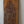 Hand-carved wooden door panel with intricate floral Balinese design