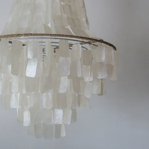 Handcrafted seashell chandelier with layered capiz shells, luxury home decor lighting
