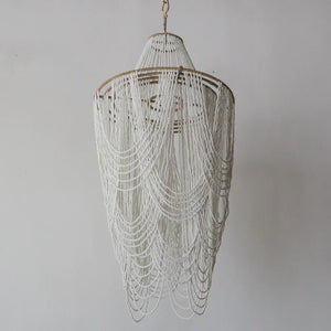 Handmade Balinese seashell chandelier with cascading white beaded strands, boho decor