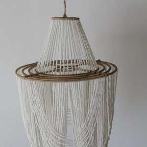 Handmade Balinese seashell chandelier with natural fiber accents, hanging decor piece