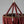 Handmade red beaded chandelier with boho decor style, close-up detail.