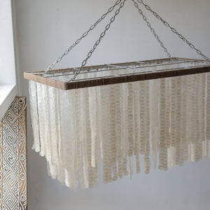 Handmade Rectangle Capiz Shell Chandelier from Bali, showcasing unique seashell design with elegant motifs.