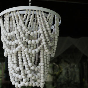 Handmade white beaded chandelier with cascading strands, boho home decor style
