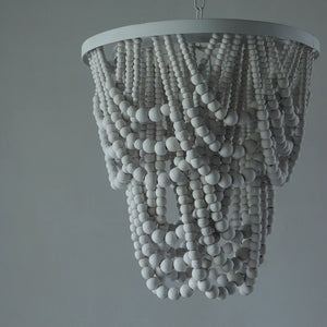 White beaded chandelier with cascading strands, handmade Balinese home decor lighting