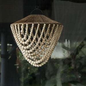 Handmade Balinese beaded chandelier with natural wood accents, hanging outdoor decor