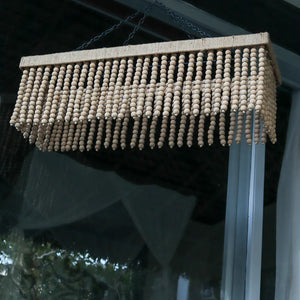 Handmade rectangular wooden bead chandelier hanging by chains, eco-friendly home decor