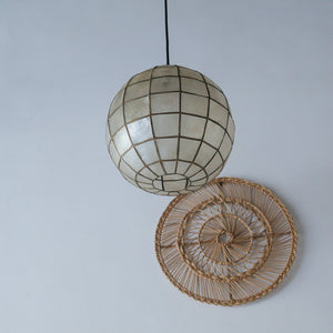 Handcrafted seashell pendant light with woven rattan wall decor, Balinese home accents