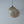 Handcrafted seashell globe pendant light with woven rattan accent, eco-friendly Balinese home decor