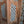 Hand-carved wooden door panel with blue floral lattice design, Balinese decor