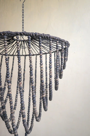 Handmade black beaded chandelier with organic texture, rustic Balinese home decor
