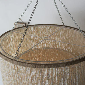 Handmade Balinese seashell chandelier with metal chains, natural artisan home decor