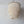 Handmade seashell chandelier with layered, natural beads hanging from a chain