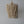 Boho hanging chandelier with natural wooden beads and carved wall bracket, neutral decor