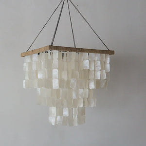 Handmade seashell chandelier with rectangular capiz shells and natural fiber trim