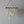 Handcrafted seashell chandelier with rectangular white shell pieces and woven details