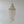 Handmade Balinese seashell chandelier with spiral design on a neutral background