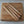 Set of four natural wooden furniture legs on a rustic wood table, eco-friendly decor