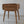 Hand-carved wooden nightstand with rattan drawer and ornate Bali-inspired details
