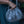 Wire Mesh Hand Woven Bag Lily held by a person, showcasing its unique handwoven brass mesh texture.