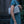 Wire Mesh Hand Woven Bag Melati held by a woman, showcasing its unique handwoven brass mesh design.