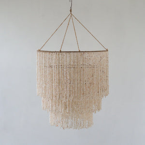 Handmade Balinese seashell chandelier with layered beaded strands, eco-friendly decor