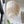 Handmade tiered seashell chandelier in a modern room with tropical decor