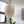 Handmade Balinese seashell chandelier hanging in a bright, modern room