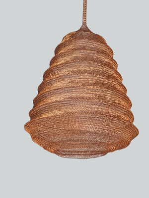 Handwoven iron mesh lampshade with warm lighting, modern pendant light decor