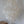 Handmade large capiz shell chandelier with cascading white discs in a modern interior