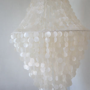 Modern seashell chandelier with cascading white capiz shells for elegant home decor